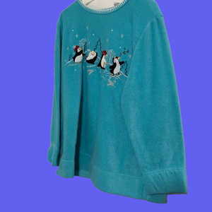 Ladiesfleece pullover with glittery penguins on front/back. Size 18W/20W.